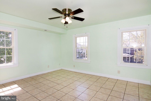 330 E Broadway, Salem, NJ 08079 - spare room with baseboards, ceiling fan, and light tile patterned flooring