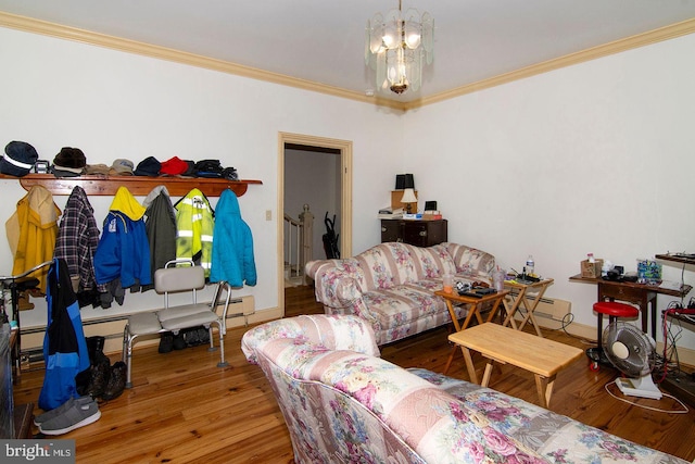 330 E Broadway, Salem, NJ 08079 - living area with crown molding, a baseboard heating unit, wood finished floors, and a notable chandelier