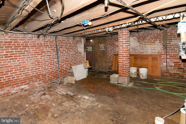 330 E Broadway, Salem, NJ 08079 - unfinished below grade area featuring brick wall