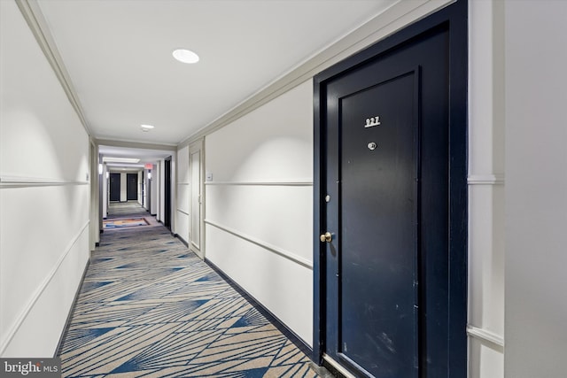 hallway featuring crown molding, carpet floors, and recessed lighting