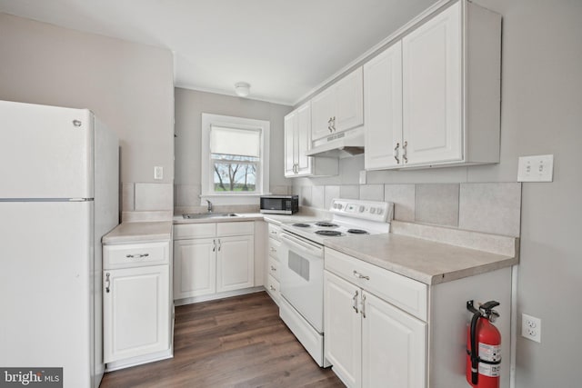 673 Harrisonville Rd, Swedesboro, NJ 08085 - kitchen featuring a sink, white appliances, light countertops, white cabinets, and under cabinet range hood