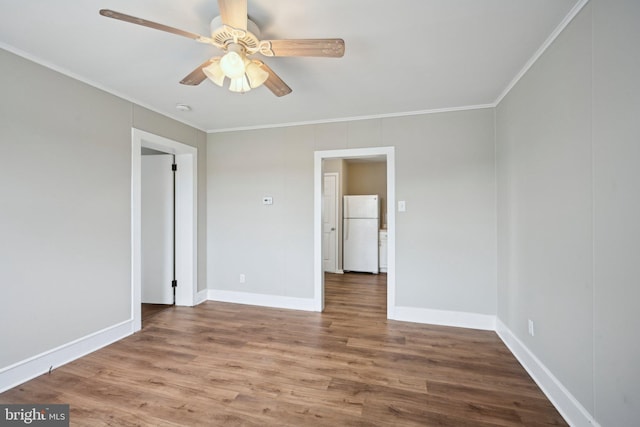 673 Harrisonville Rd, Swedesboro, NJ 08085 - unfurnished room with a ceiling fan, baseboards, crown molding, and wood finished floors