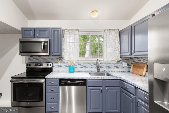 1276 Courtney Ln, Belcamp, MD 21017 - kitchen with stainless steel appliances, a sink, tasteful backsplash, and light countertops