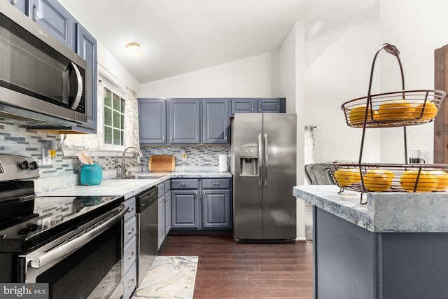 1276 Courtney Ln, Belcamp, MD 21017 - kitchen with appliances with stainless steel finishes, a sink, lofted ceiling, gray cabinetry, and dark wood-style flooring