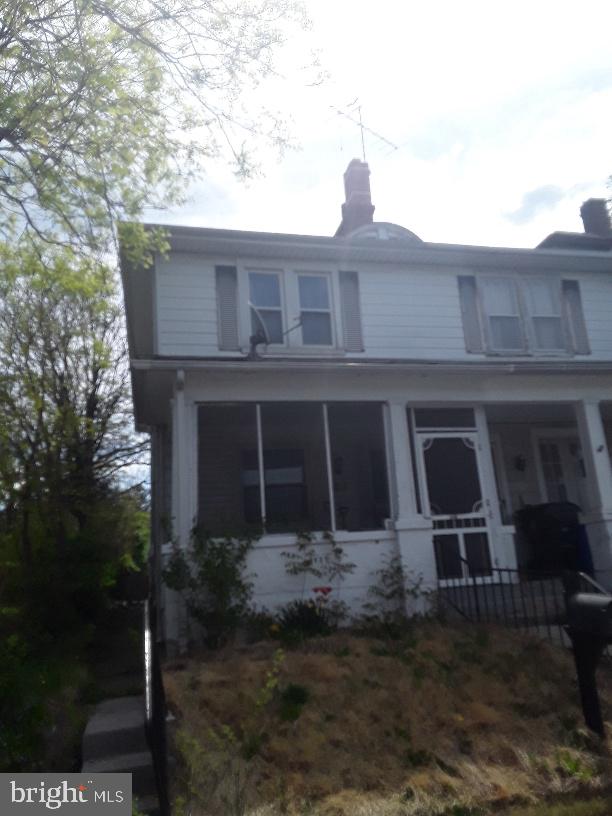 view of front of home with a chimney
