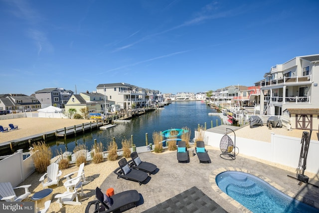 1181 Jennifer Ln, Manahawkin, NJ 08050 - exterior space with a residential view, a patio, a fenced in pool, fence, and a water view