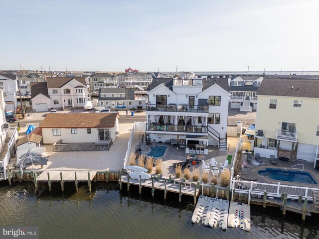1181 Jennifer Ln, Manahawkin, NJ 08050 - exterior space featuring a water view and a residential view