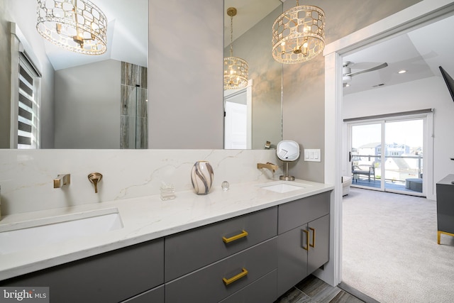1181 Jennifer Ln, Manahawkin, NJ 08050 - bathroom with double vanity, a sink, and a chandelier