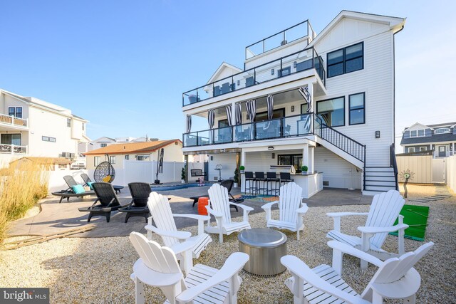 1181 Jennifer Ln, Manahawkin, NJ 08050 - back of property with a patio, fence, and a balcony