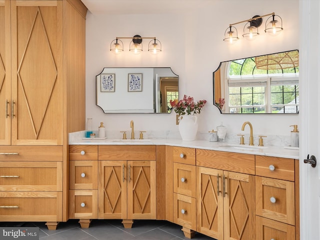 full bath featuring tile patterned flooring, a sink, and double vanity