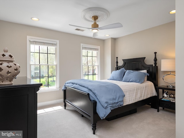 bedroom with visible vents, light carpet, baseboards, recessed lighting, and a ceiling fan