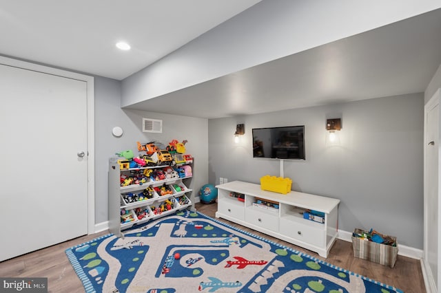 421 N 20th St, Philadelphia, PA 19130 - playroom with wood finished floors and baseboards