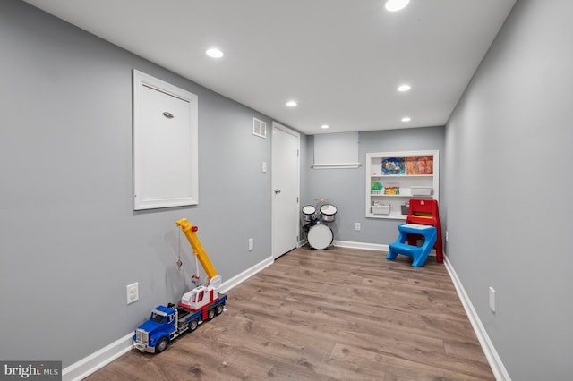 421 N 20th St, Philadelphia, PA 19130 - rec room with recessed lighting, wood finished floors, and baseboards