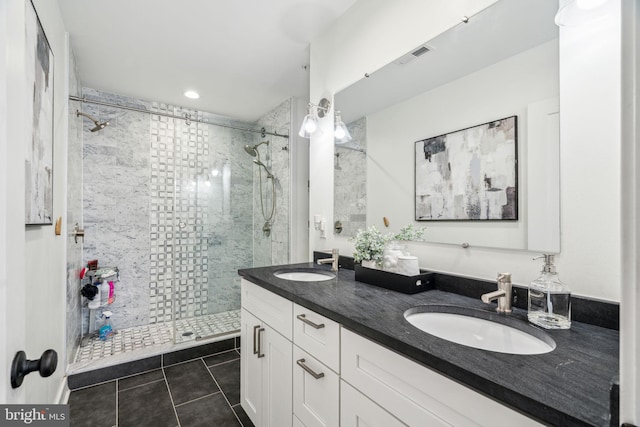 1029 Earl St, Philadelphia, PA 19125 - full bath featuring a shower stall, double vanity, tile patterned floors, and recessed lighting