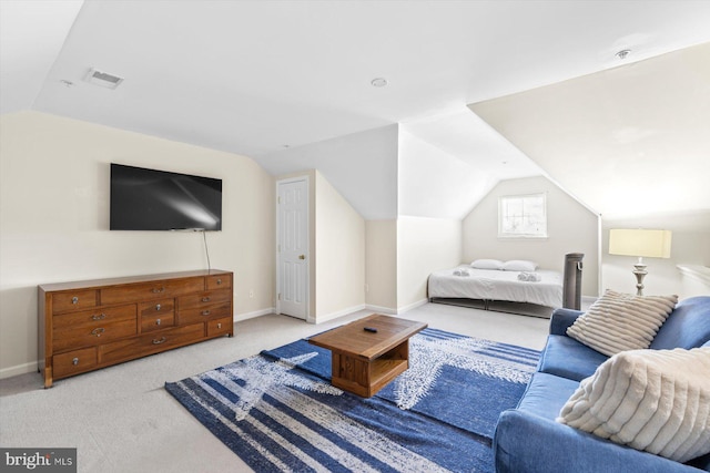 carpeted bedroom with baseboards, visible vents, and lofted ceiling