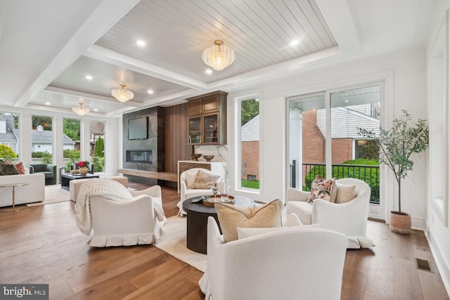 38 Birchall Dr, Haddonfield, NJ 08033 - living room with plenty of natural light, a raised ceiling, light wood-style floors, a fireplace, and recessed lighting