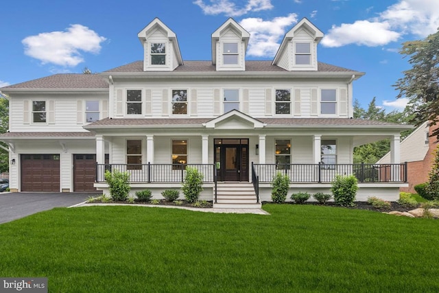 38 Birchall Dr, Haddonfield, NJ 08033 - view of front facade with an attached garage, asphalt driveway, covered porch, and a front yard