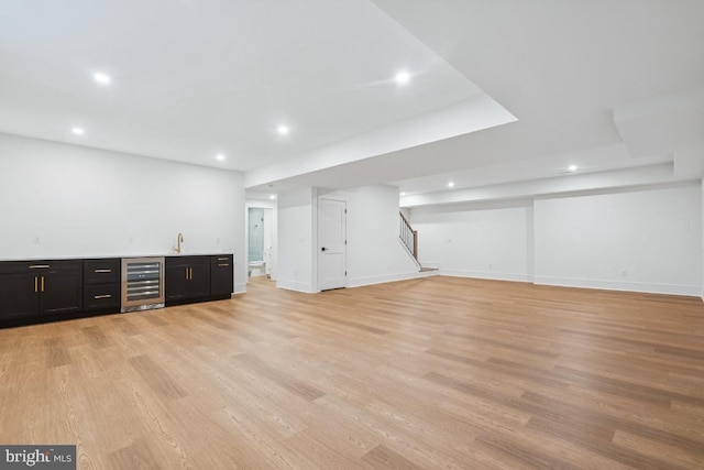 38 Birchall Dr, Haddonfield, NJ 08033 - finished below grade area with wine cooler, bar with sink, recessed lighting, light wood-type flooring, and stairs