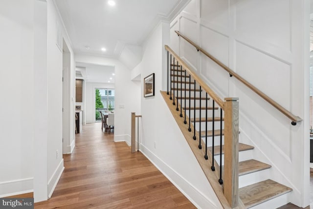 38 Birchall Dr, Haddonfield, NJ 08033 - stairway with wood finished floors, recessed lighting, and crown molding