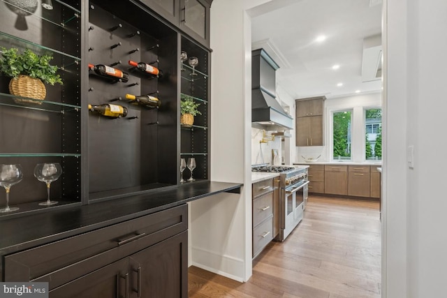 38 Birchall Dr, Haddonfield, NJ 08033 - kitchen featuring range with two ovens, premium range hood, light wood-style flooring, and recessed lighting