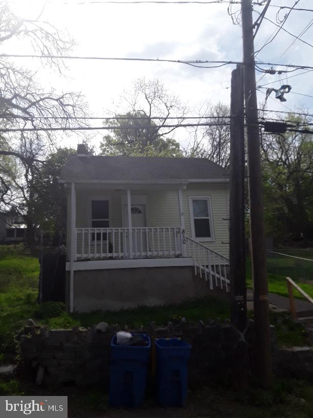 810 Mohn St, Harrisburg, PA 17113 - bungalow-style house featuring covered porch, a chimney, and a shingled roof