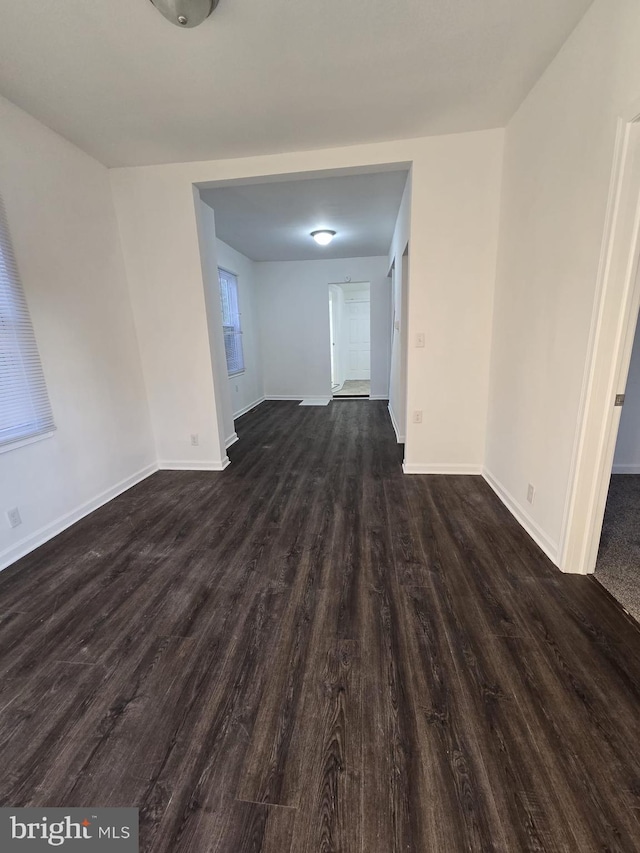 810 Mohn St, Harrisburg, PA 17113 - unfurnished room featuring baseboards and dark wood finished floors