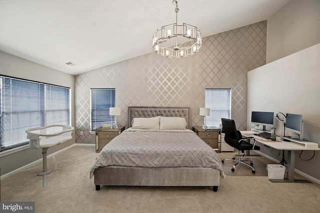carpeted bedroom featuring wallpapered walls, visible vents, an accent wall, baseboards, and a notable chandelier