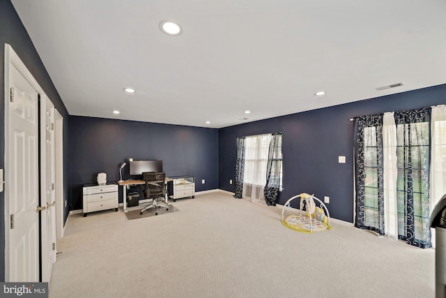 carpeted office featuring baseboards, visible vents, and recessed lighting