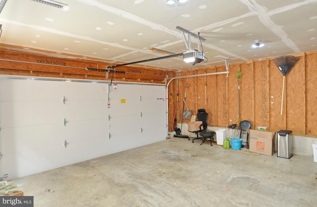 garage featuring a garage door opener