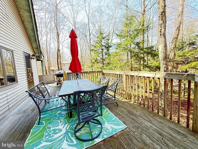 437 Orono Dr, Pocono Lake, PA 18347 - wooden deck featuring a grill and outdoor dining space