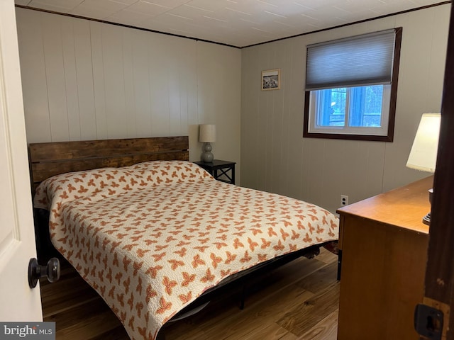 437 Orono Dr, Pocono Lake, PA 18347 - bedroom featuring wooden walls and wood finished floors