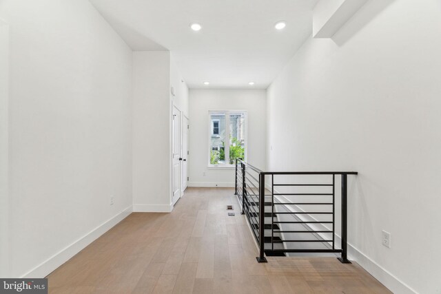 1810 Federal St Unit 1, Philadelphia, PA 19146 - corridor featuring an upstairs landing, wood finished floors, baseboards, and recessed lighting
