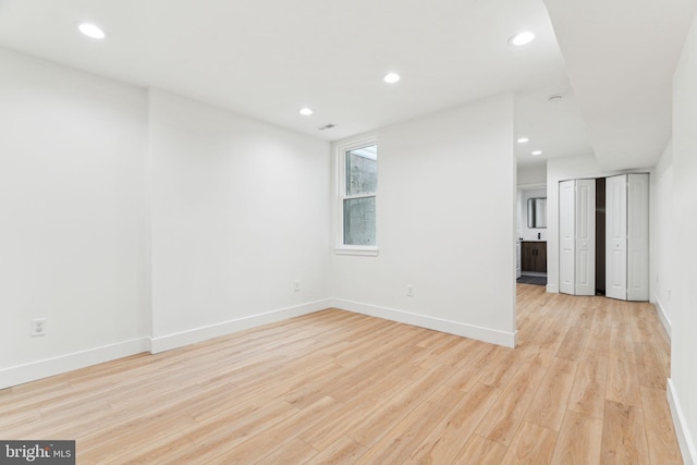1810 Federal St Unit 1, Philadelphia, PA 19146 - unfurnished living room with light wood finished floors, recessed lighting, and baseboards