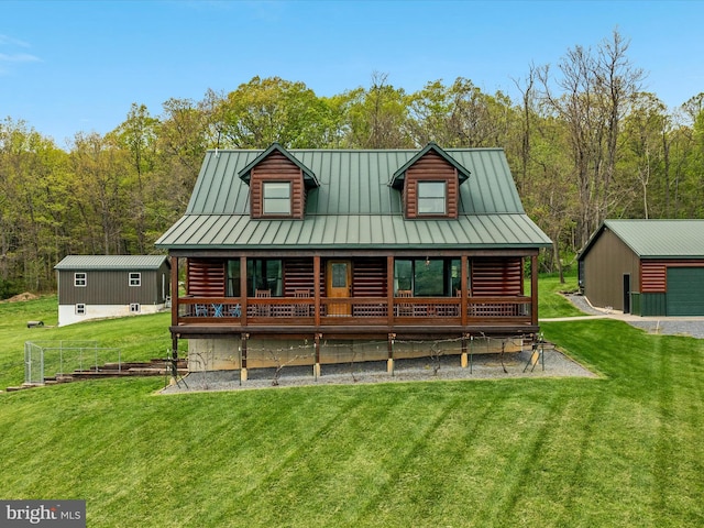 4437 Stonewall Jackson Hwy, Bentonville, VA 22610 - rear view of house with a standing seam roof, a yard, and metal roof