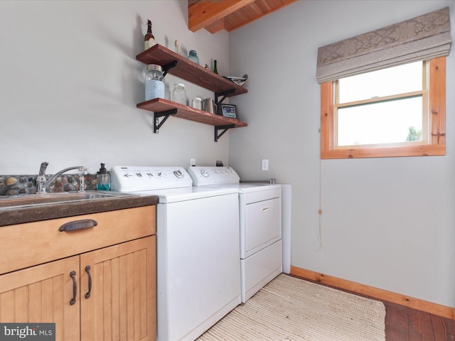 4437 Stonewall Jackson Hwy, Bentonville, VA 22610 - laundry area with cabinet space, washer and clothes dryer, baseboards, and a sink