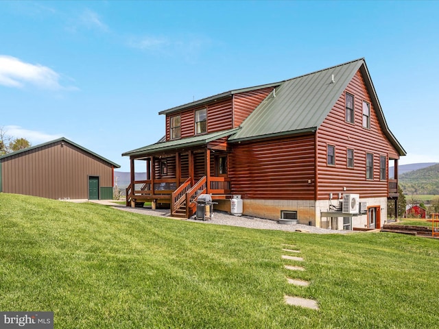 4437 Stonewall Jackson Hwy, Bentonville, VA 22610 - rear view of property featuring ac unit, a yard, and metal roof