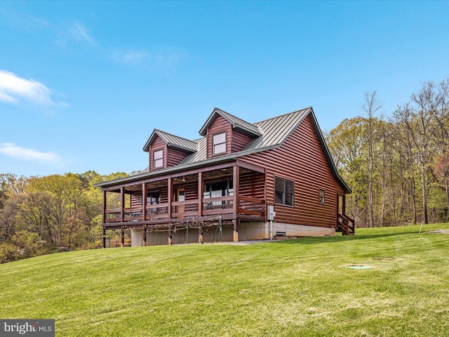 4437 Stonewall Jackson Hwy, Bentonville, VA 22610 - view of front of home featuring a standing seam roof, log veneer siding, a front yard, and metal roof