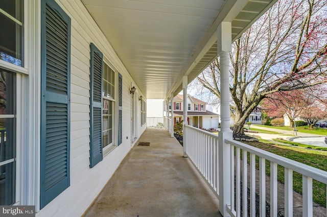 balcony with a porch and a residential view