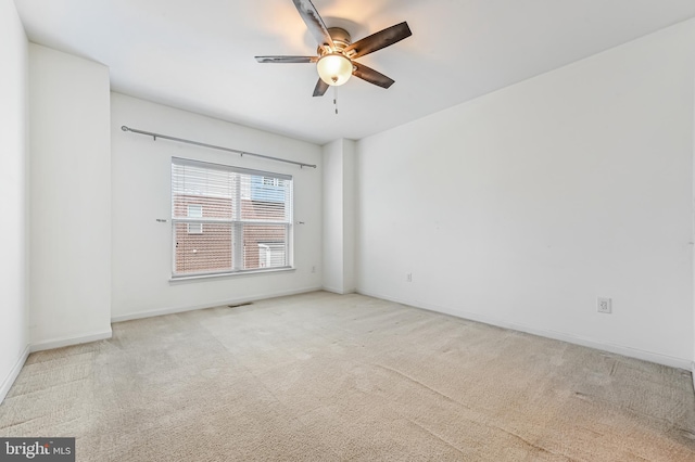 543 Leftwich Ln, Annapolis, MD 21401 - empty room featuring a ceiling fan, carpet, and baseboards
