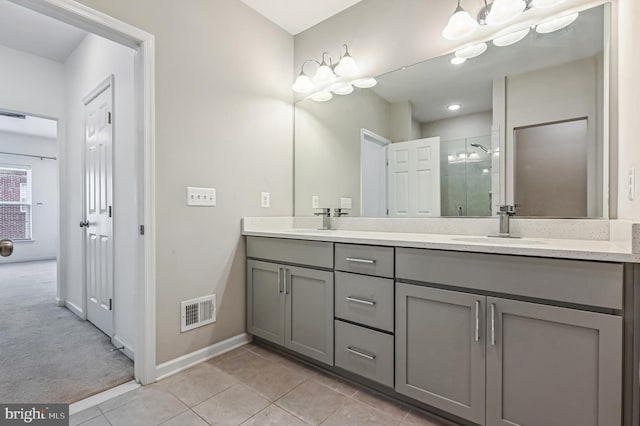 543 Leftwich Ln, Annapolis, MD 21401 - full bathroom featuring a stall shower, baseboards, tile patterned floors, and double vanity