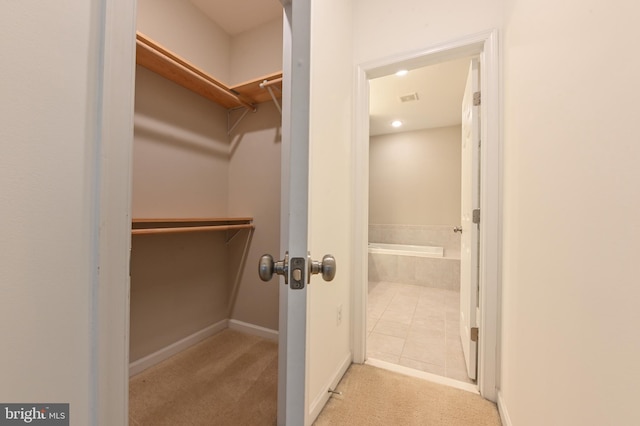 543 Leftwich Ln, Annapolis, MD 21401 - spacious closet featuring carpet flooring and tile patterned flooring