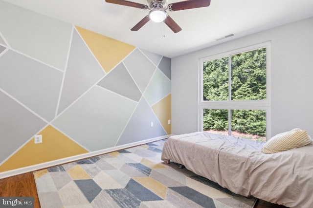 5608 Bismach Dr Unit 103, Alexandria, VA 22312 - bedroom with baseboards, a ceiling fan, wood finished floors, and visible vents