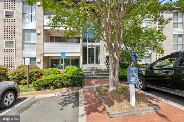 5608 Bismach Dr Unit 103, Alexandria, VA 22312 - view of building exterior featuring uncovered parking