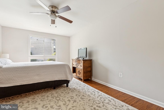 5608 Bismach Dr Unit 103, Alexandria, VA 22312 - bedroom featuring wood finished floors, baseboards, and ceiling fan