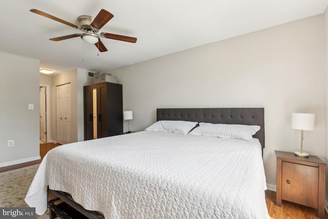 5608 Bismach Dr Unit 103, Alexandria, VA 22312 - bedroom with visible vents, baseboards, a ceiling fan, wood finished floors, and a closet