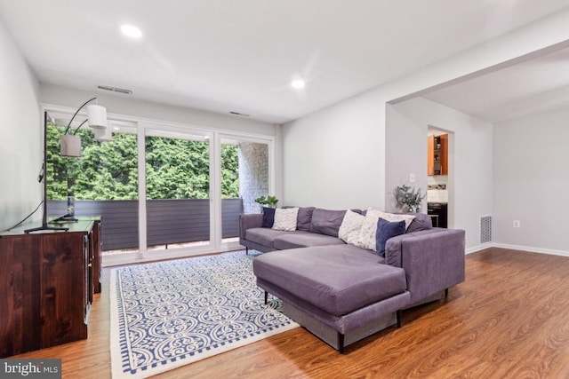 5608 Bismach Dr Unit 103, Alexandria, VA 22312 - living room with wood finished floors, visible vents, and recessed lighting