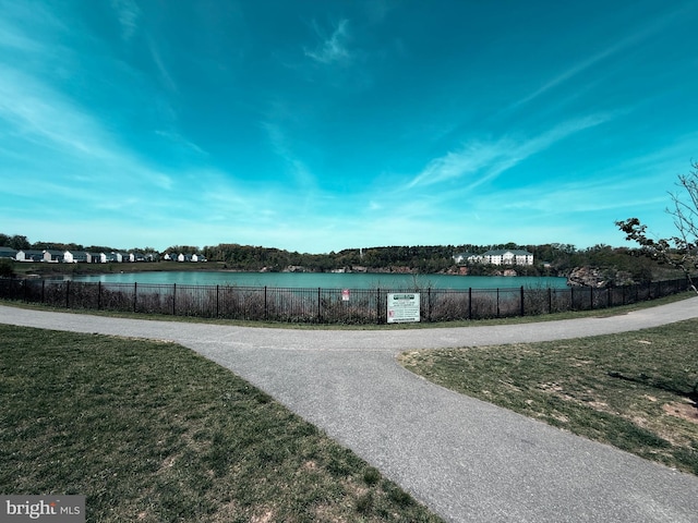 11902 Tarragon Rd Unit J, Reisterstown, MD 21136 - surrounding community with a lawn, a water view, and fence