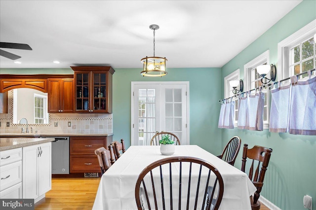 128 Pinion Pl, Bear, DE 19701 - dining space featuring recessed lighting, light wood-style floors, plenty of natural light, and ceiling fan with notable chandelier