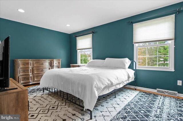 128 Pinion Pl, Bear, DE 19701 - bedroom with baseboards, wood finished floors, visible vents, and recessed lighting