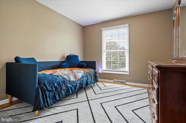 128 Pinion Pl, Bear, DE 19701 - bedroom featuring baseboards, wood finished floors, and visible vents